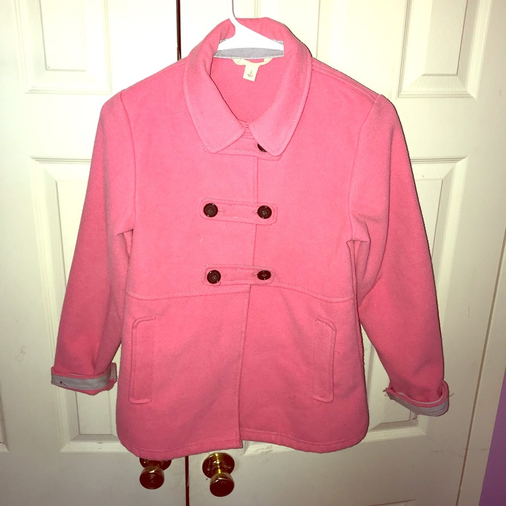A bright pink coat